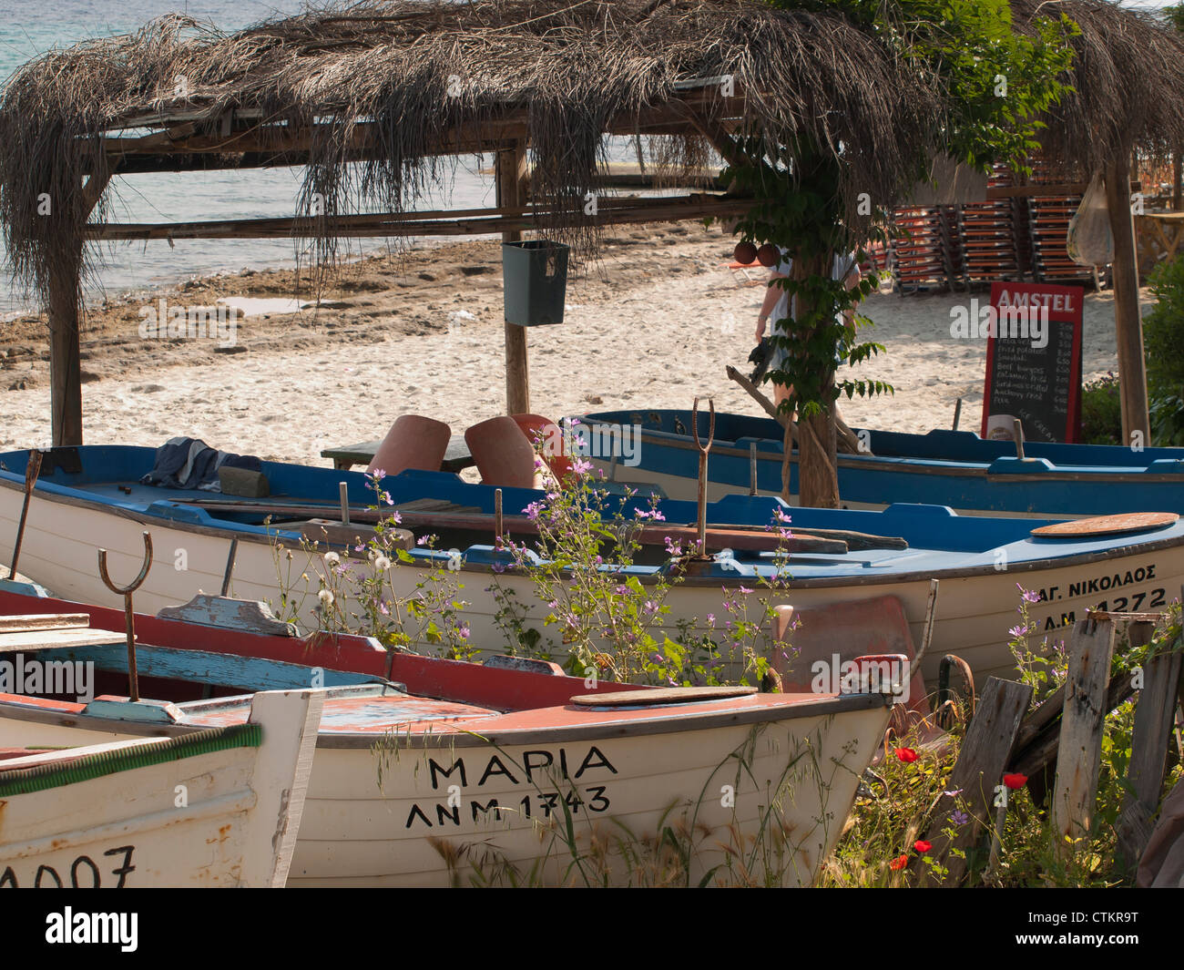 Greek fishing-boats on the beach in Chalkidiki Greece Stock Photo