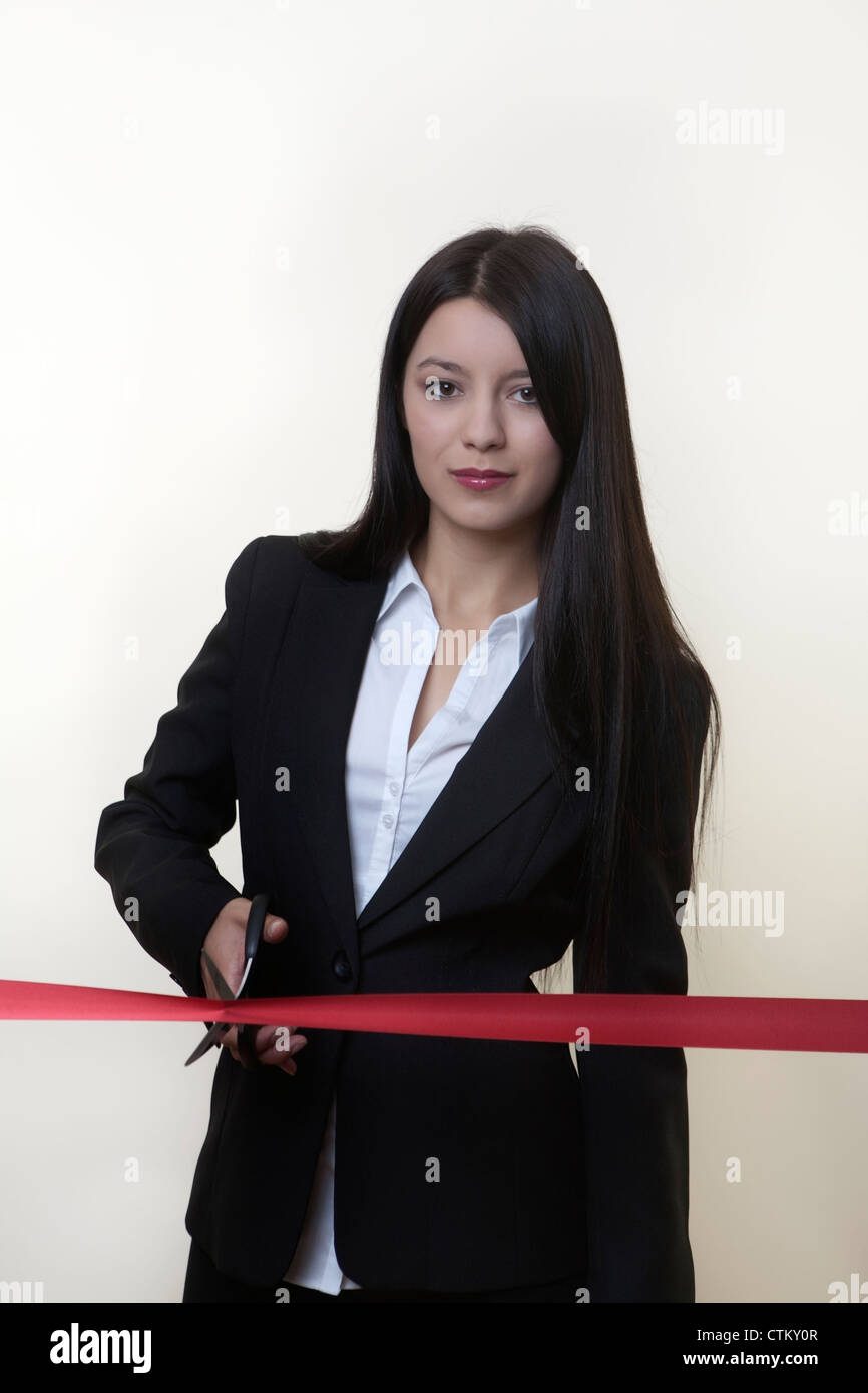 businesswoman cutting a ribbon Stock Photo - Alamy