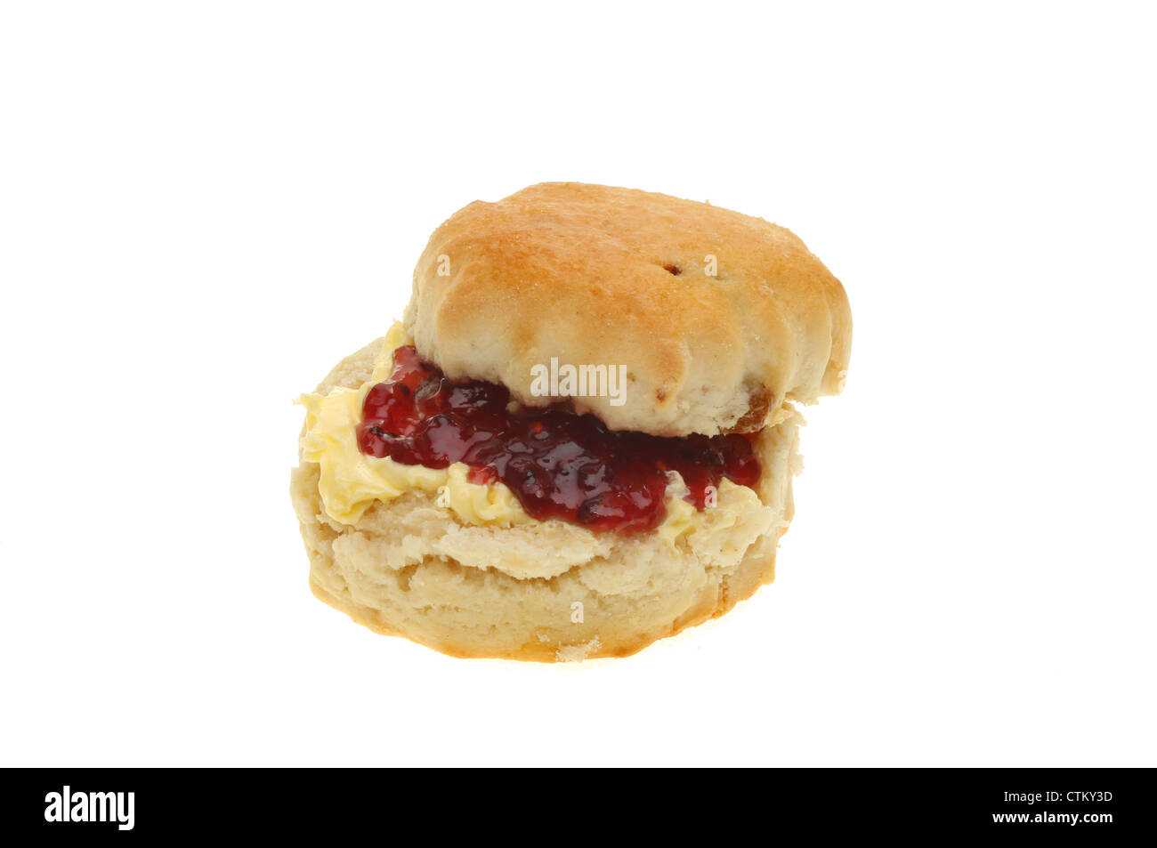 Single scone with jam and butter isolated against white Stock Photo