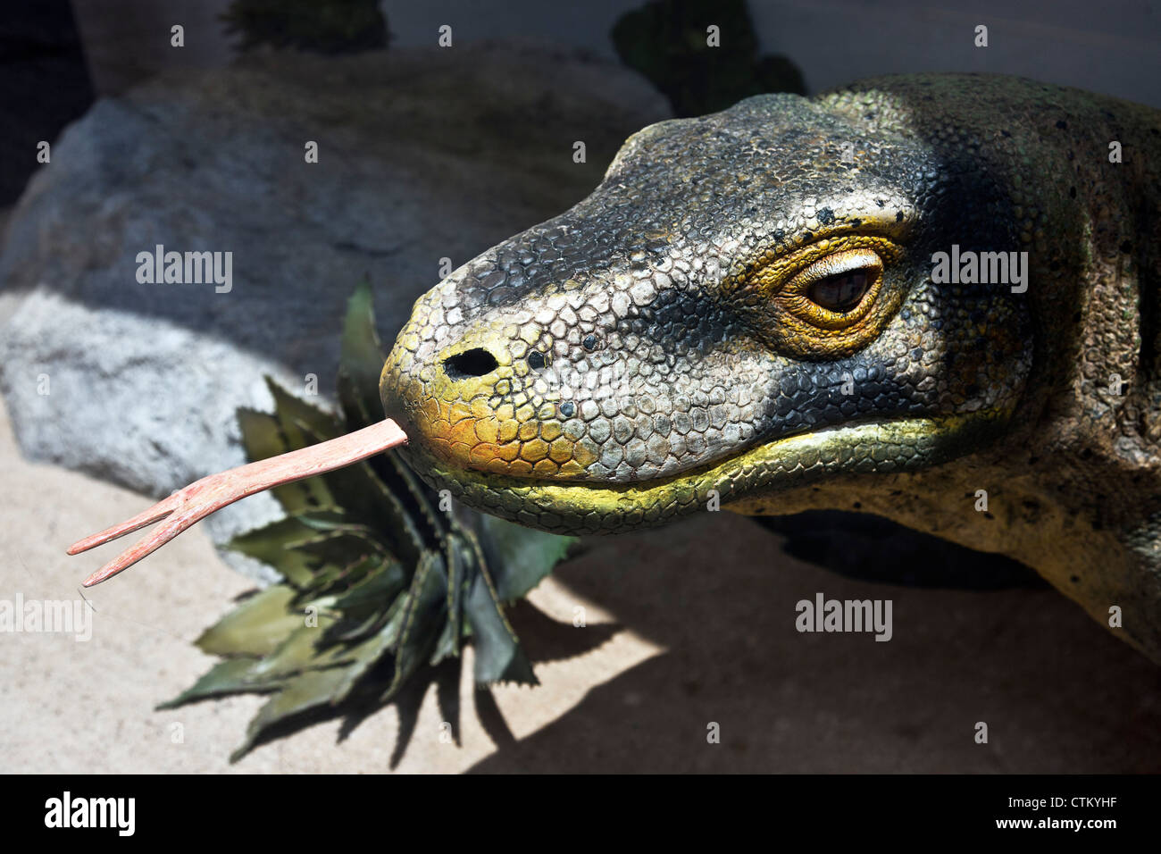 close view realistic lizard with pink forked tongue is a part of Bergdorf Goodman window display on 5th Avenue New York City Stock Photo