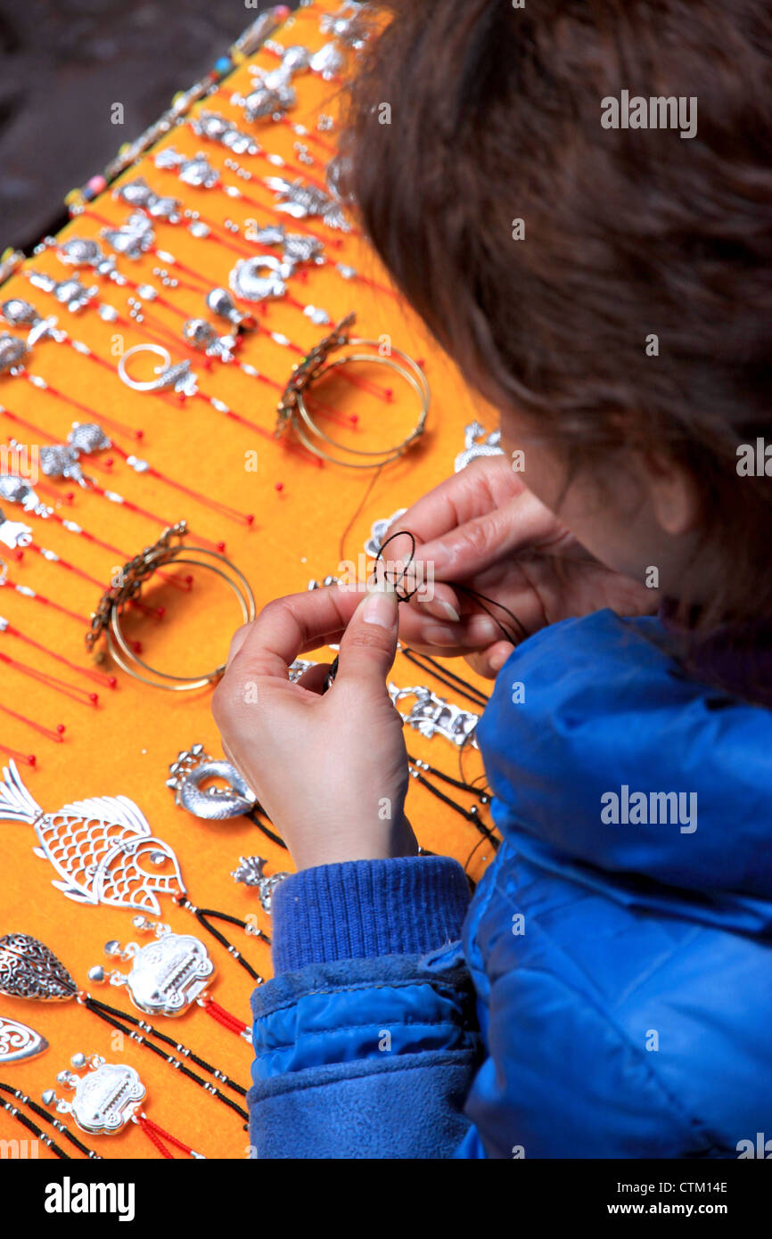 A jewelry street vendor in Fenghuang, China Stock Photo Alamy