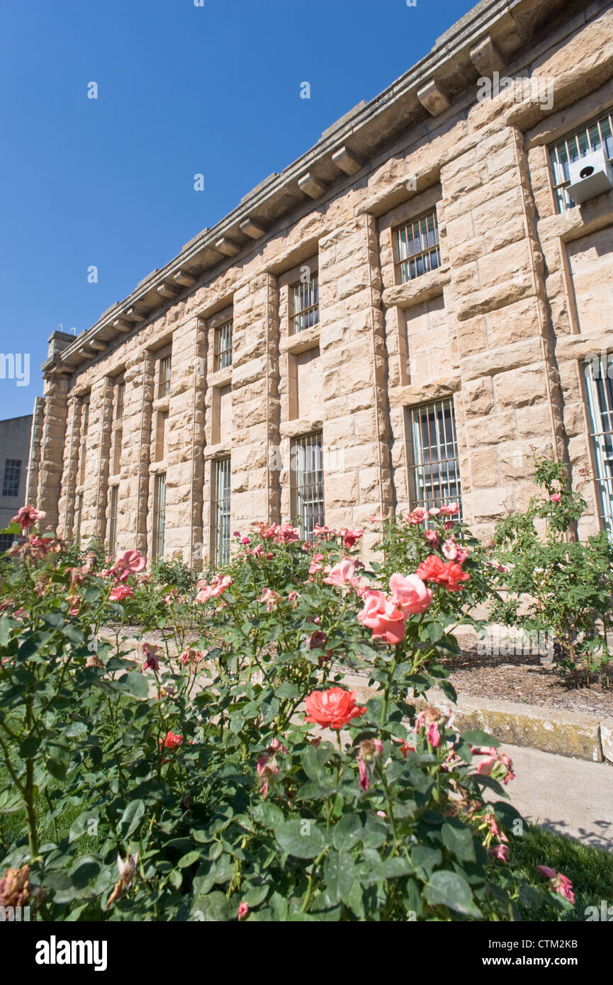 Flowers In Bloom In Front Of The Old Cell Block At The Old Idaho Stock Photo Alamy