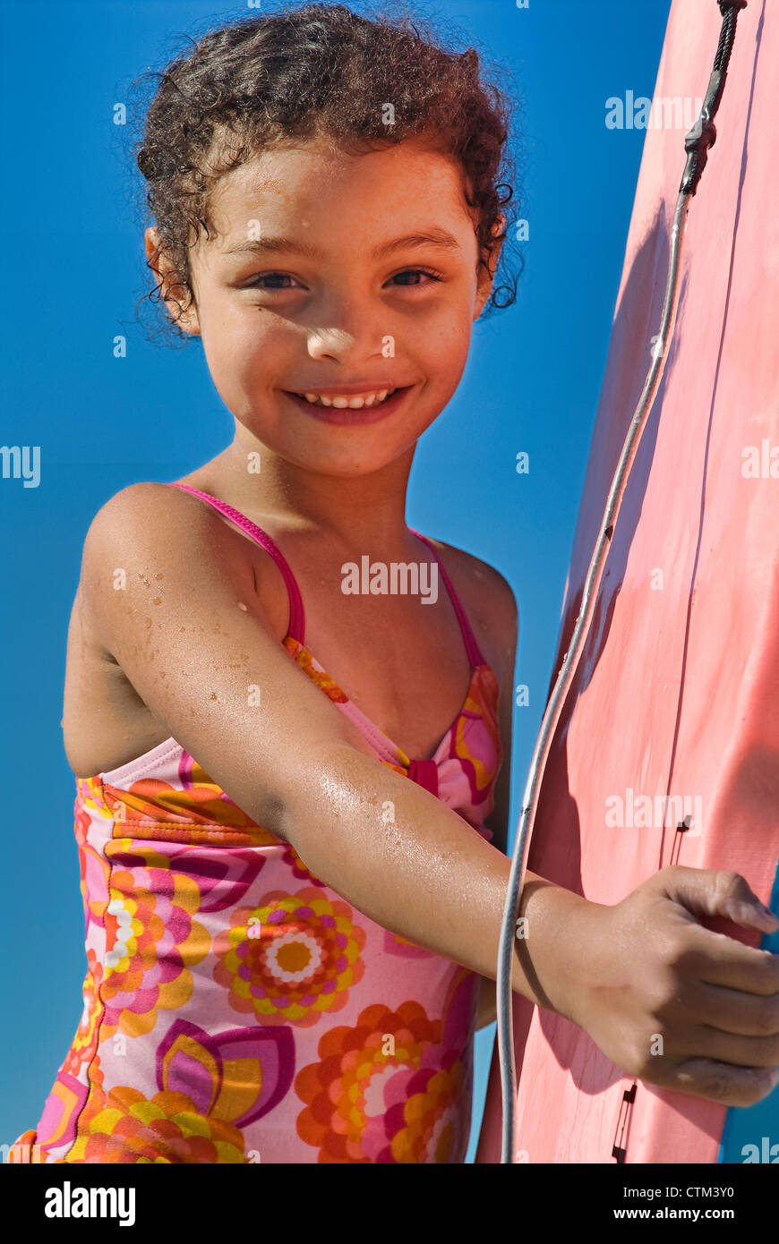 Cute girl with boogie board at the beach Stock Photo Alamy