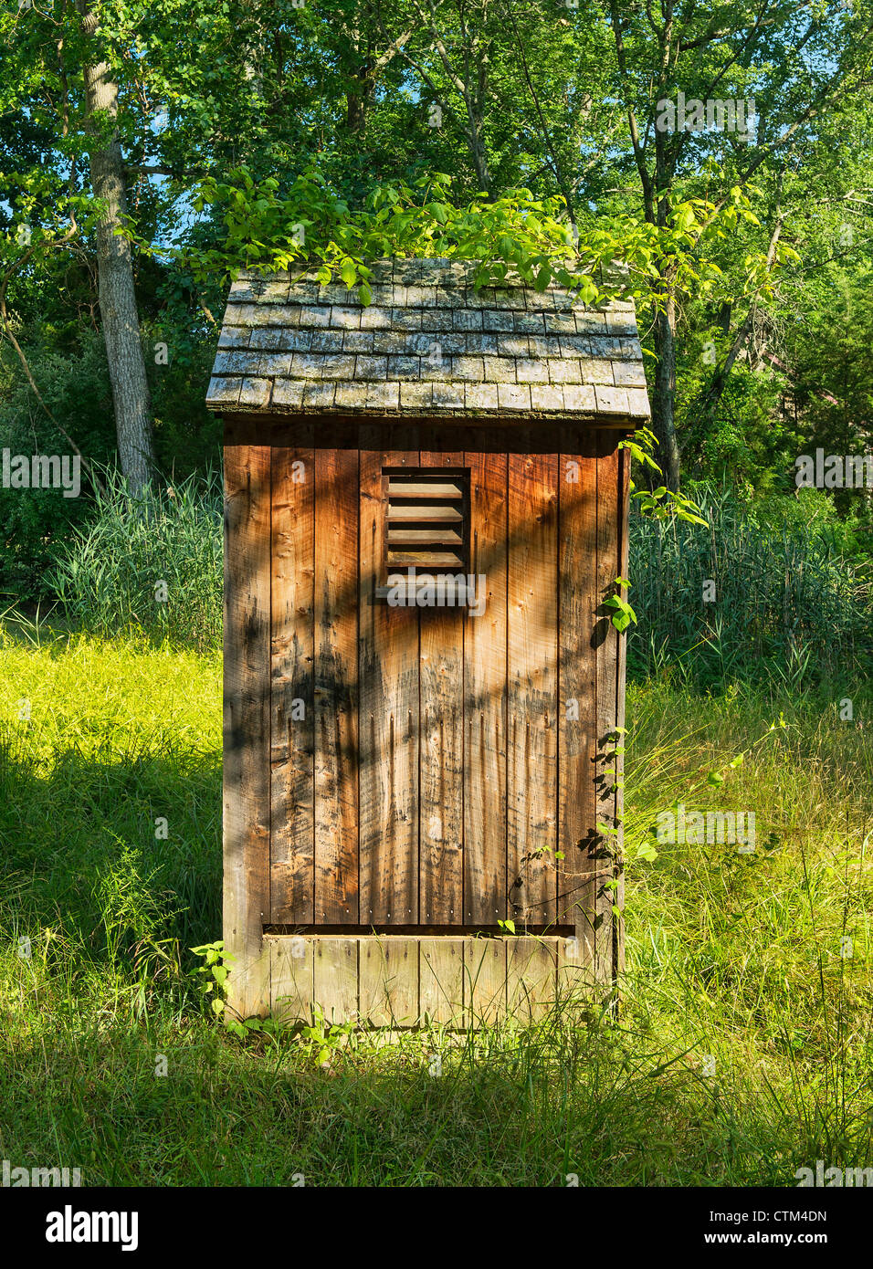Old wooden outhouse. Stock Photo