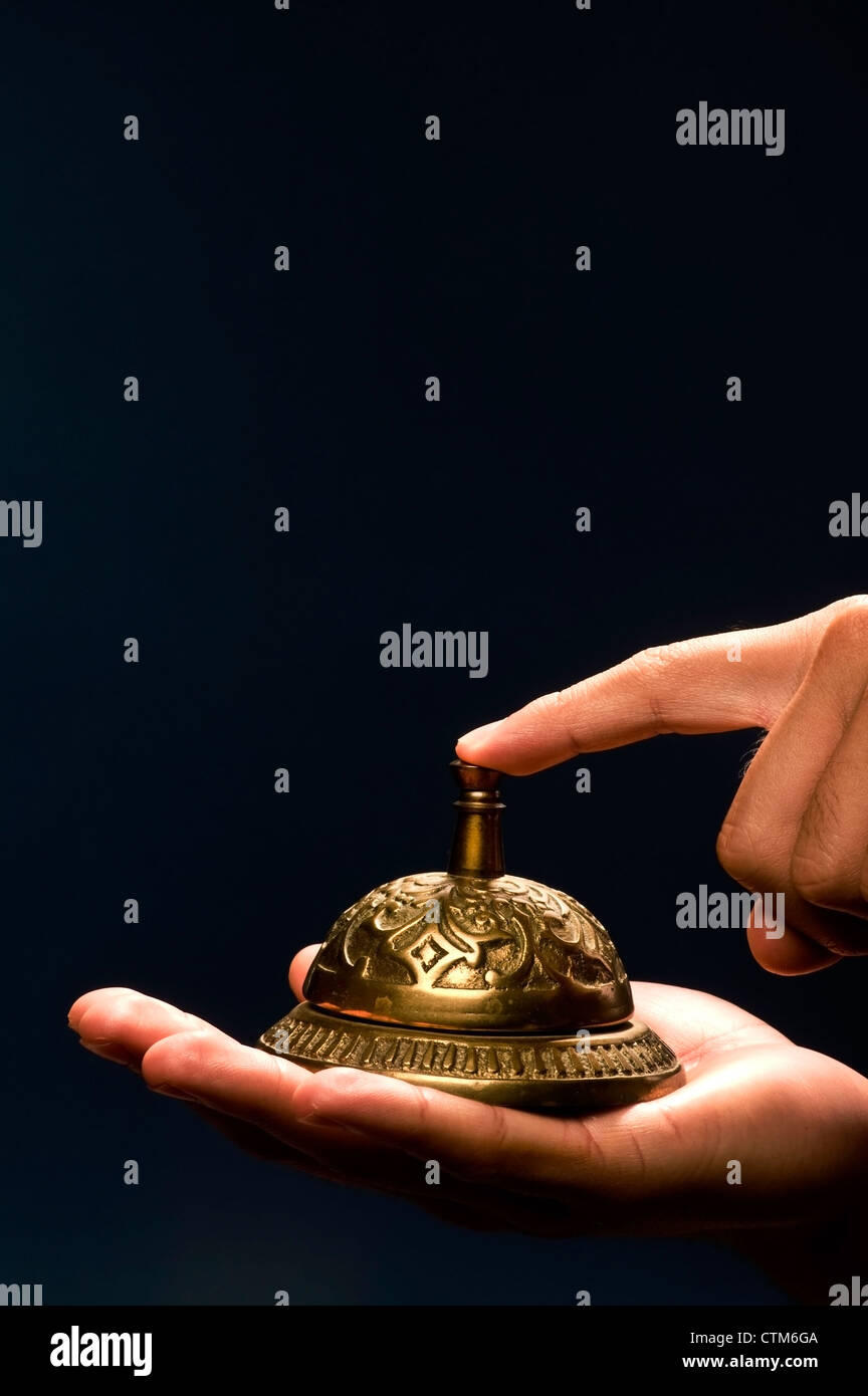 Old Brass Service Bell. Stock Photo