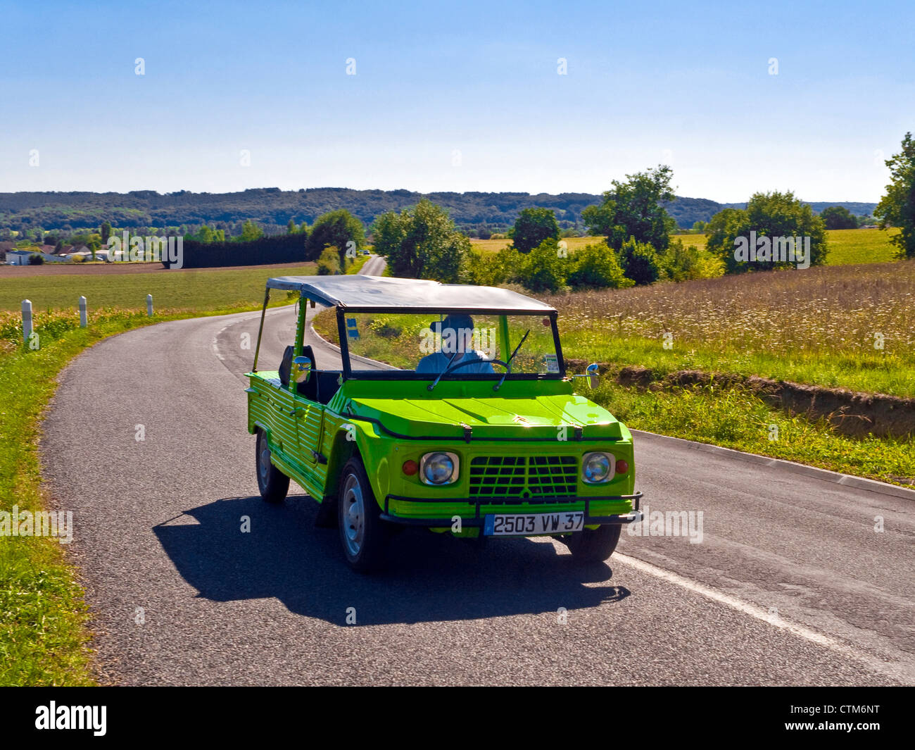 Citroen Méhari driving along country road - France. Stock Photo