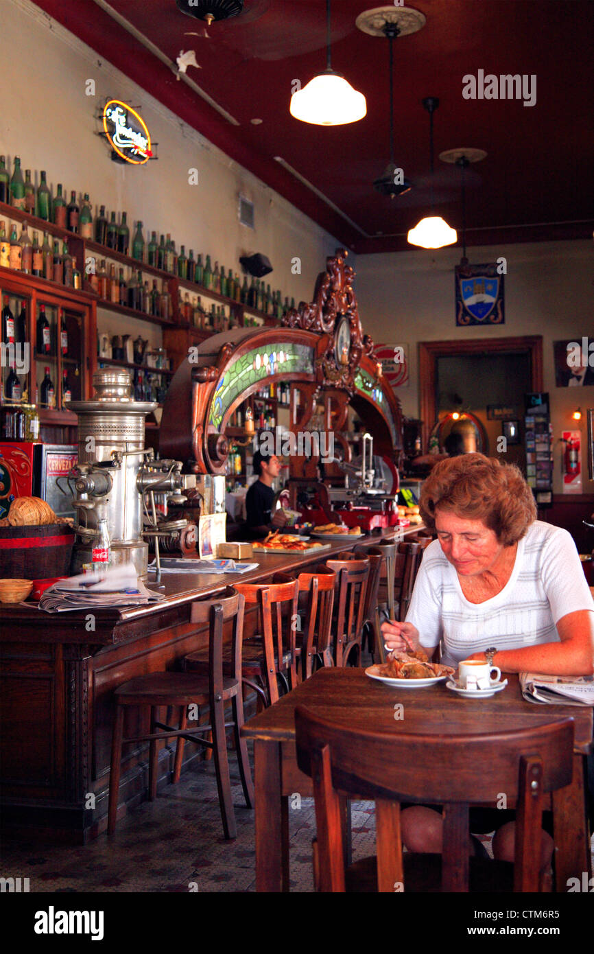 Old woman drinking coffee at 'El Federal' Bar. San telmo, Buenos Aires. Stock Photo