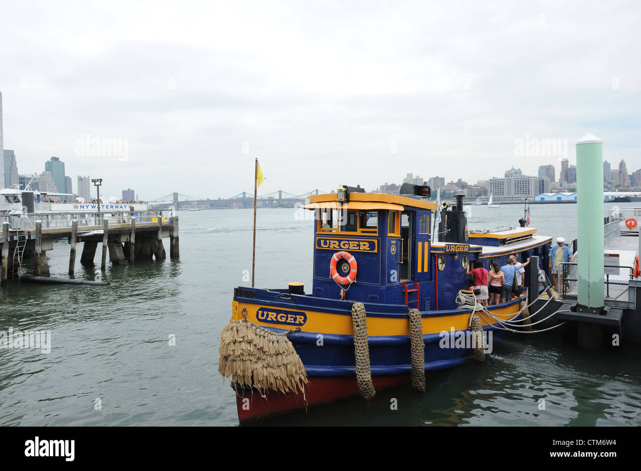 The Urger, launched in 1901 and on the National Registry of Historic Places, is the oldest operating tugboat in New York State. Stock Photo