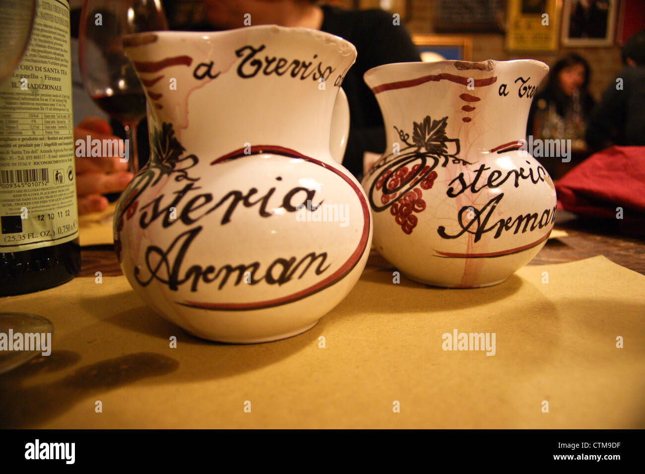 Osteria Arman restaurant  Treviso, italy - carafes of wine on the table Stock Photo