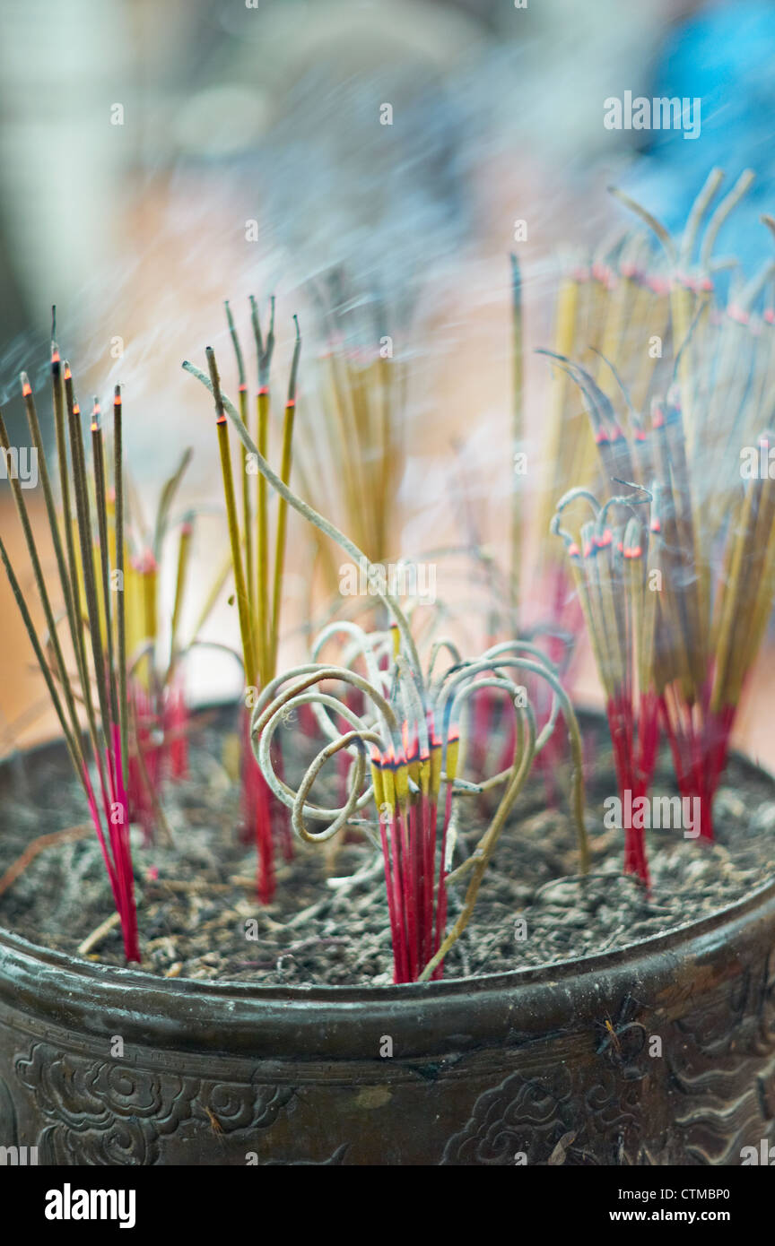 Incense burning at an altar in a temple Stock Photo Alamy