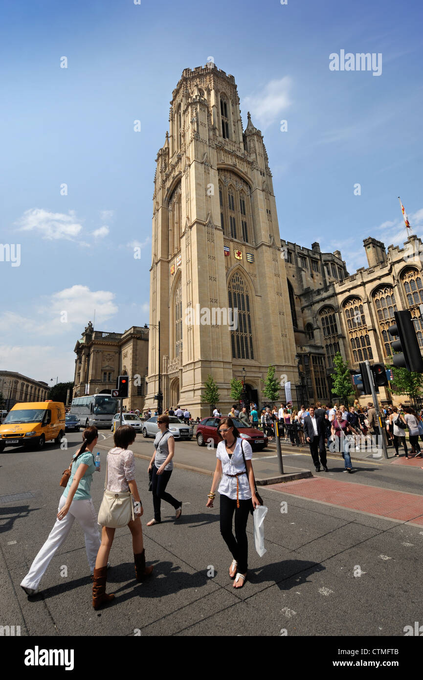 Students on a pedestrian crossing outside Bristol University's Wills Memorial Building UK Stock Photo