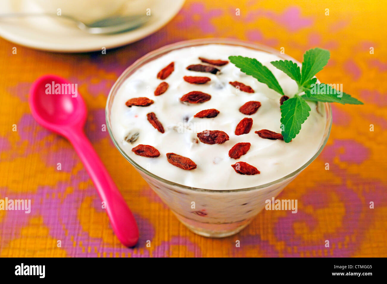 Goji berries with yogurt and stevia. Recipe available Stock Photo Alamy