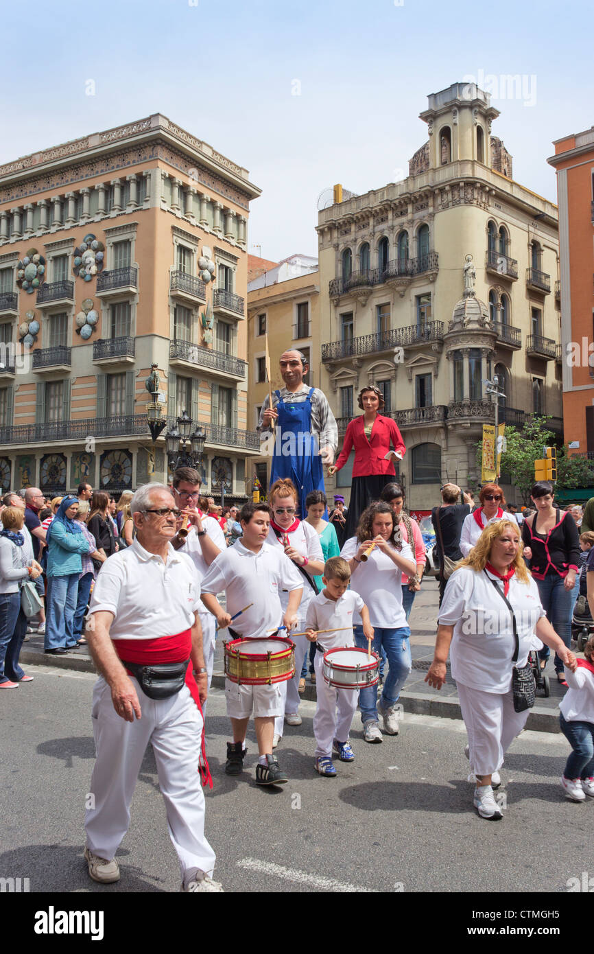 Barcelona, Spain. Procession of giant figures or Cabezudos. Stock Photo
