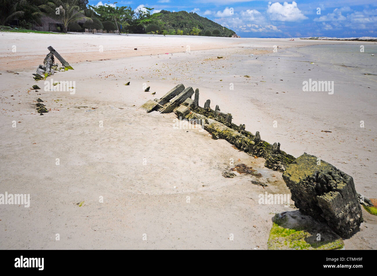 Shipwrecks on Beach with blue sky Stock Photo