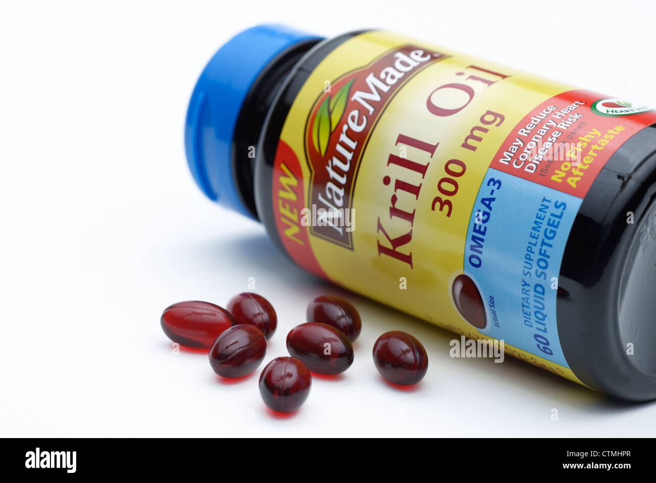 Krill oil pills, a supplemental source of Omega-3 fatty acids Stock Photo