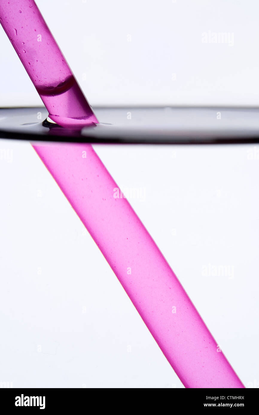 Drinking straw refracted by water Stock Photo Alamy