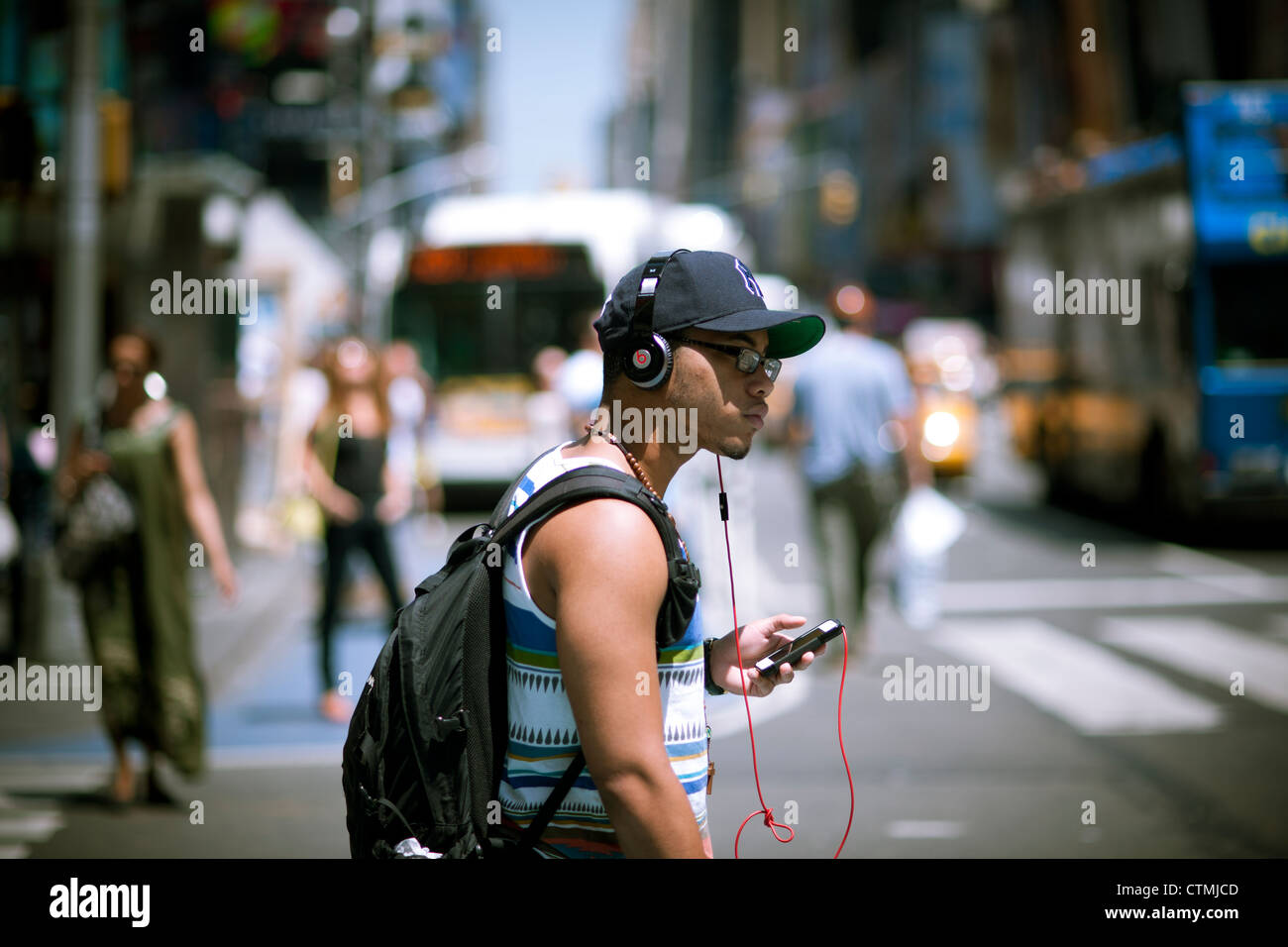 Music listeners wear their Beats by Dr. Dre headphones in New York on Wednesday, July 24, 2012 (© Richard B. Levine) Stock Photo