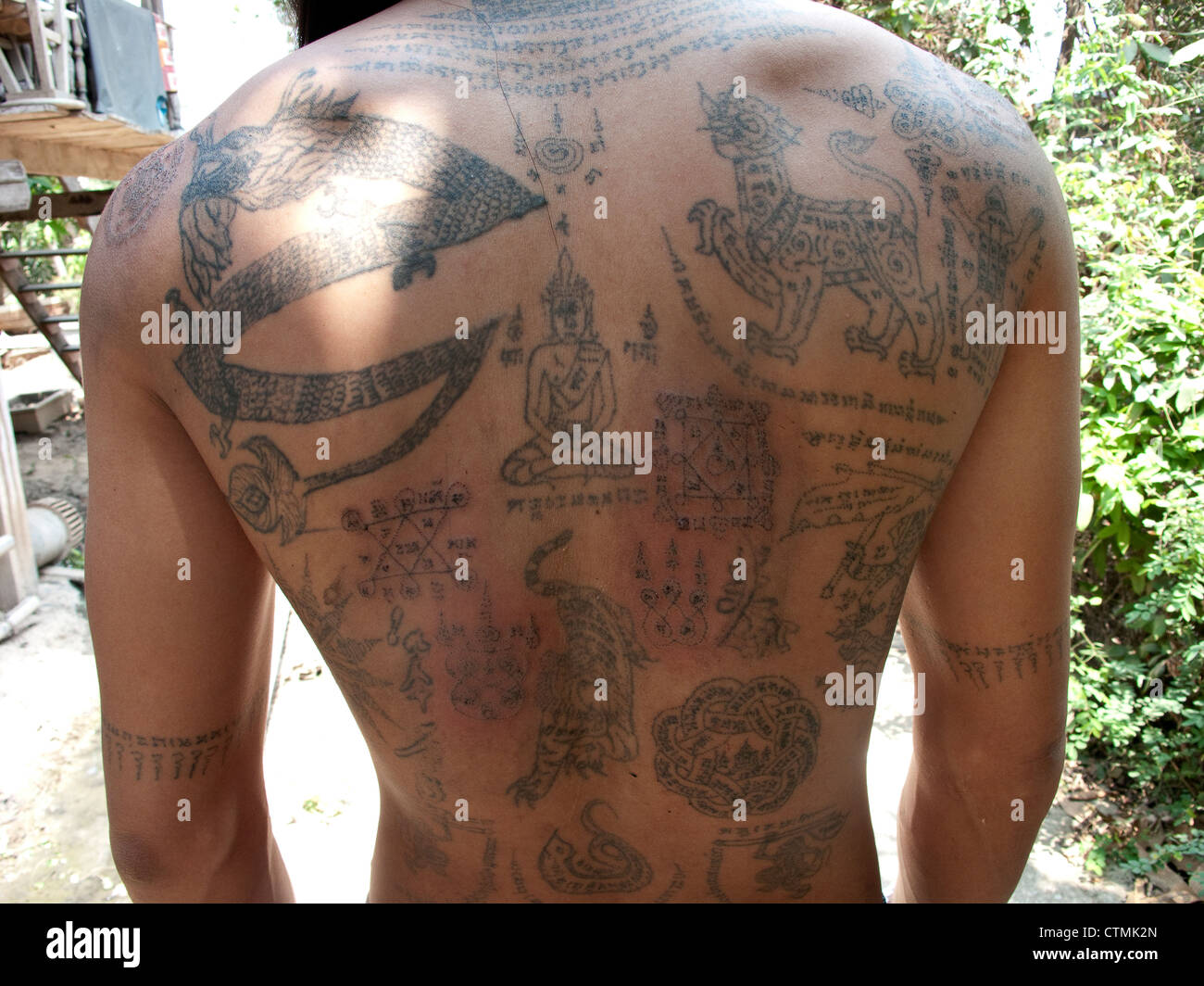 Samnak of Ajahn Pawet. Ayuthaya. Sak Yan are the mystical tattoos popular in Thailand. Stock Photo