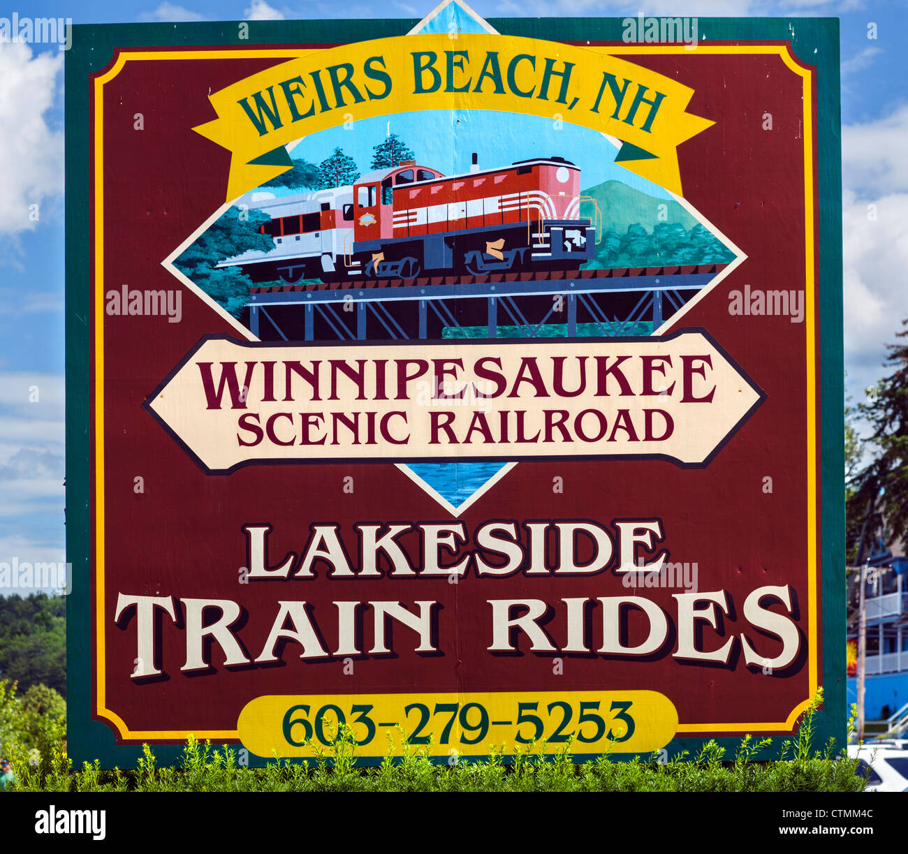 Sign for lakeside train rides in Weirs Beach on Lake Winnipesaukee, Lakes Region, New Hampshire, USA Stock Photo