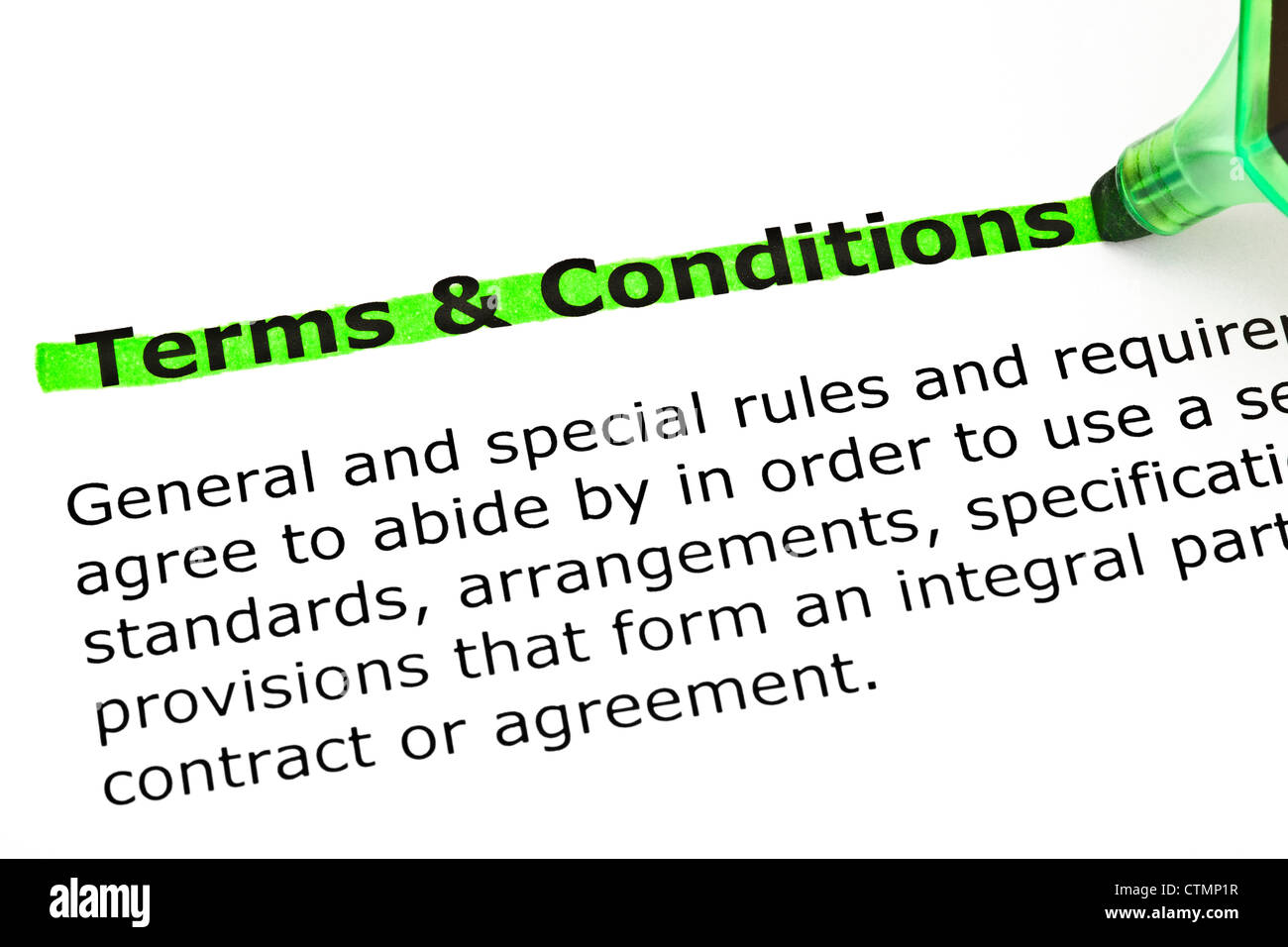 Dictionary definition of Terms and Conditions, highlighted with green marker. Stock Photo