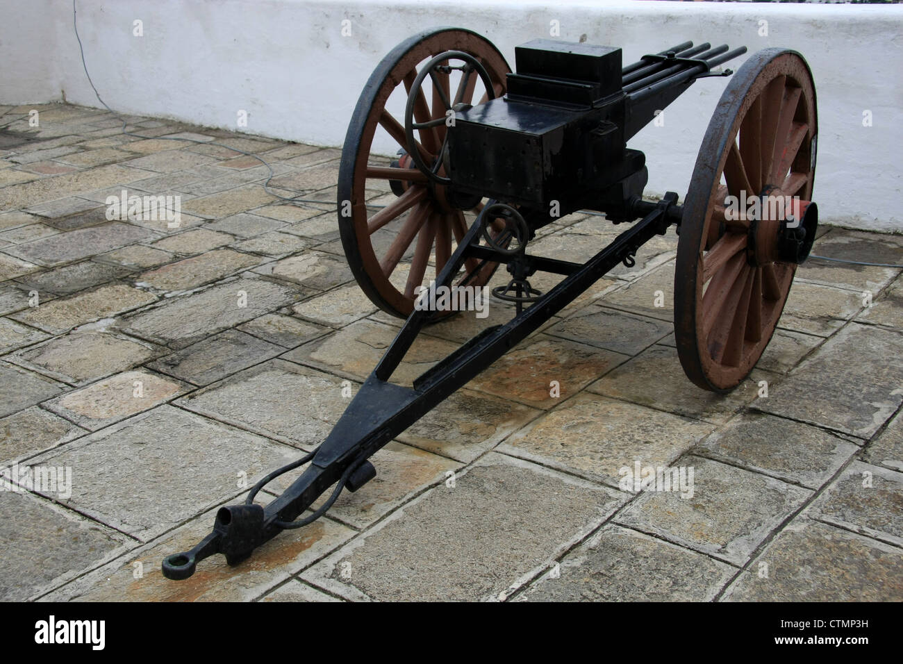 Multiple barrels of an old wheel mounted weapon at the Military Museum, Montevideo, Uruguay Stock Photo