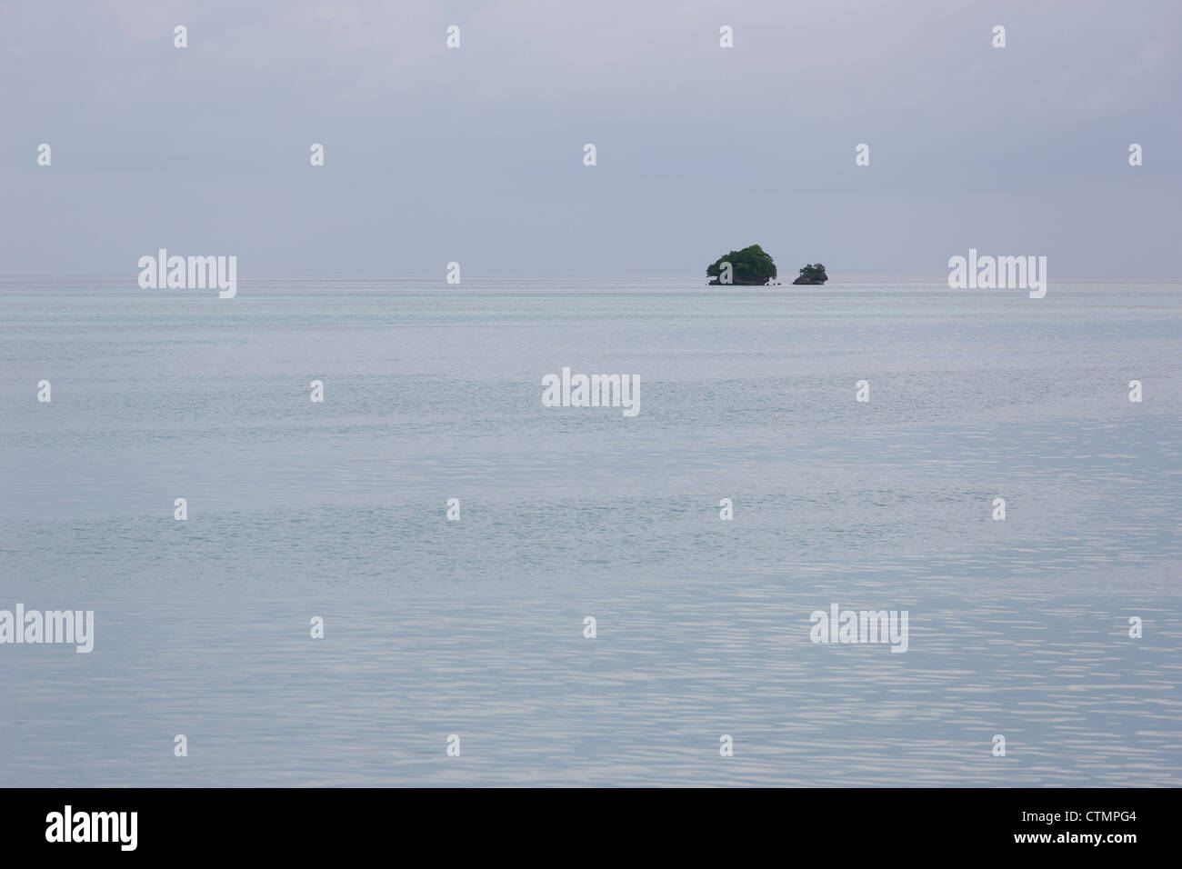 View of the islands of Palau as seen from the live aboard dive boat Ocean Hunter III at anchor near the German Channel. Stock Photo