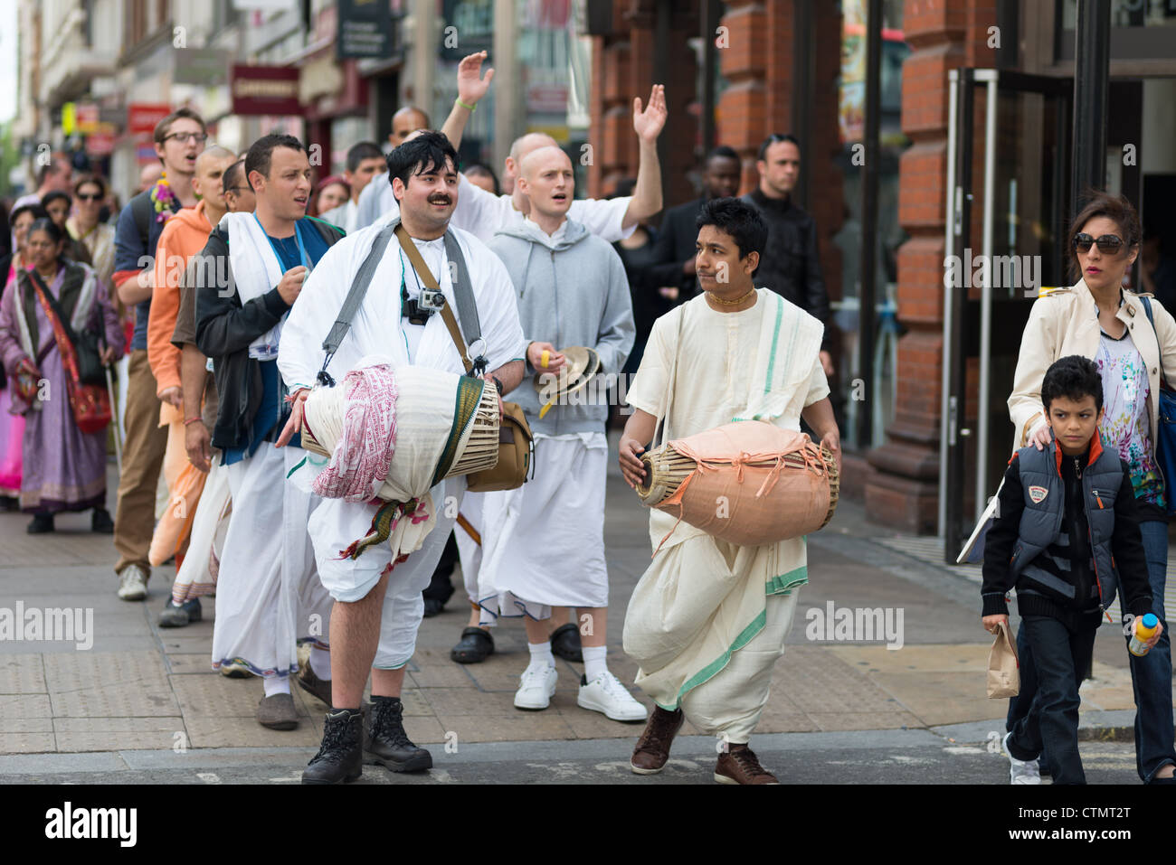 A band of Hare Krishna followers in Oxford street, London. Stock Photo
