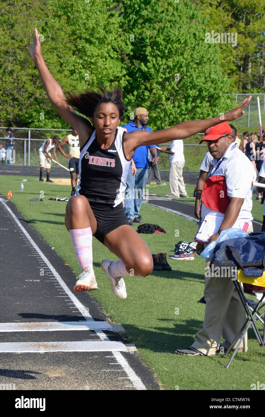 teen doing a high jump during a high school track and field event in Maryland Stock Photo Alamy