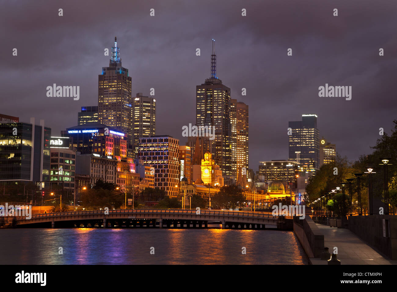 Melbourne Australia Southbank cityscape skyline at night, cit lights, view across the Yarra River showing queenbridge street Stock Photo