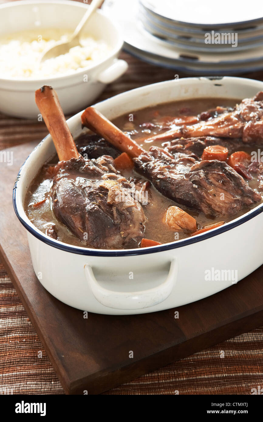 Traditional Karoo cooking. Karoo lamb shanks with creamy samp Stock Photo Alamy