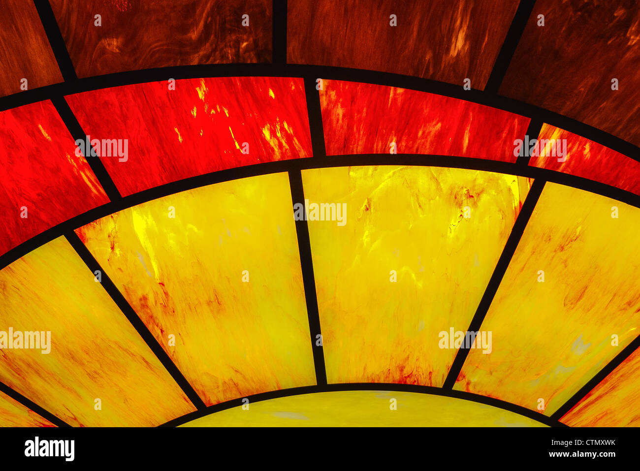 Leaded Stained glass, orange, red, yellow Stock Photo