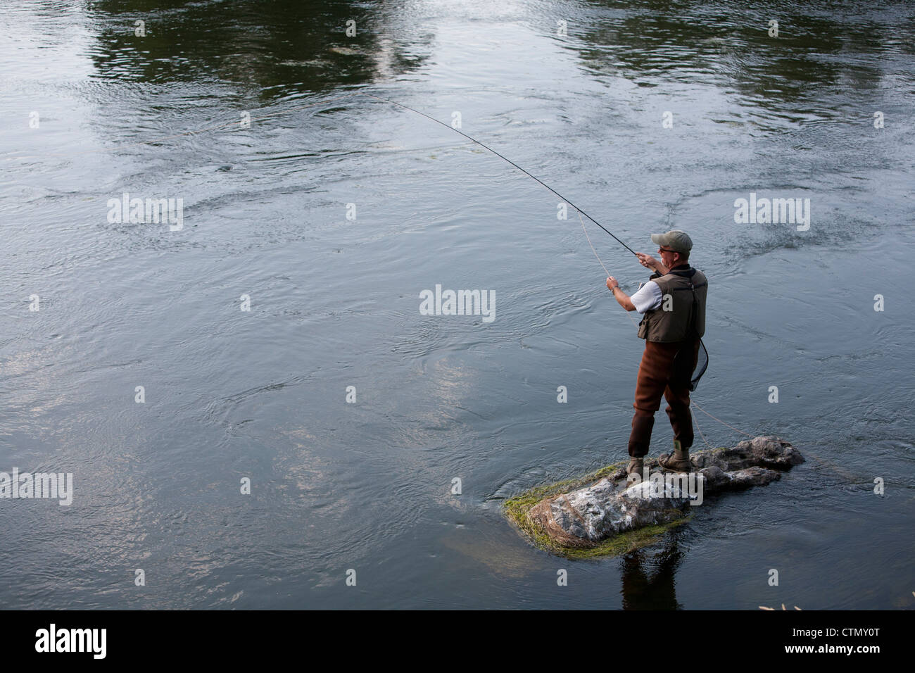 A fisherman fly fishing for trout in the Missouri River Stock Photo Alamy