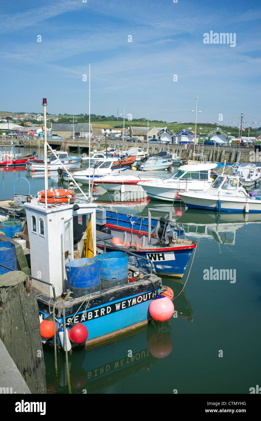 Fishing boats in West Bay Harbour Dorset UK Stock Photo