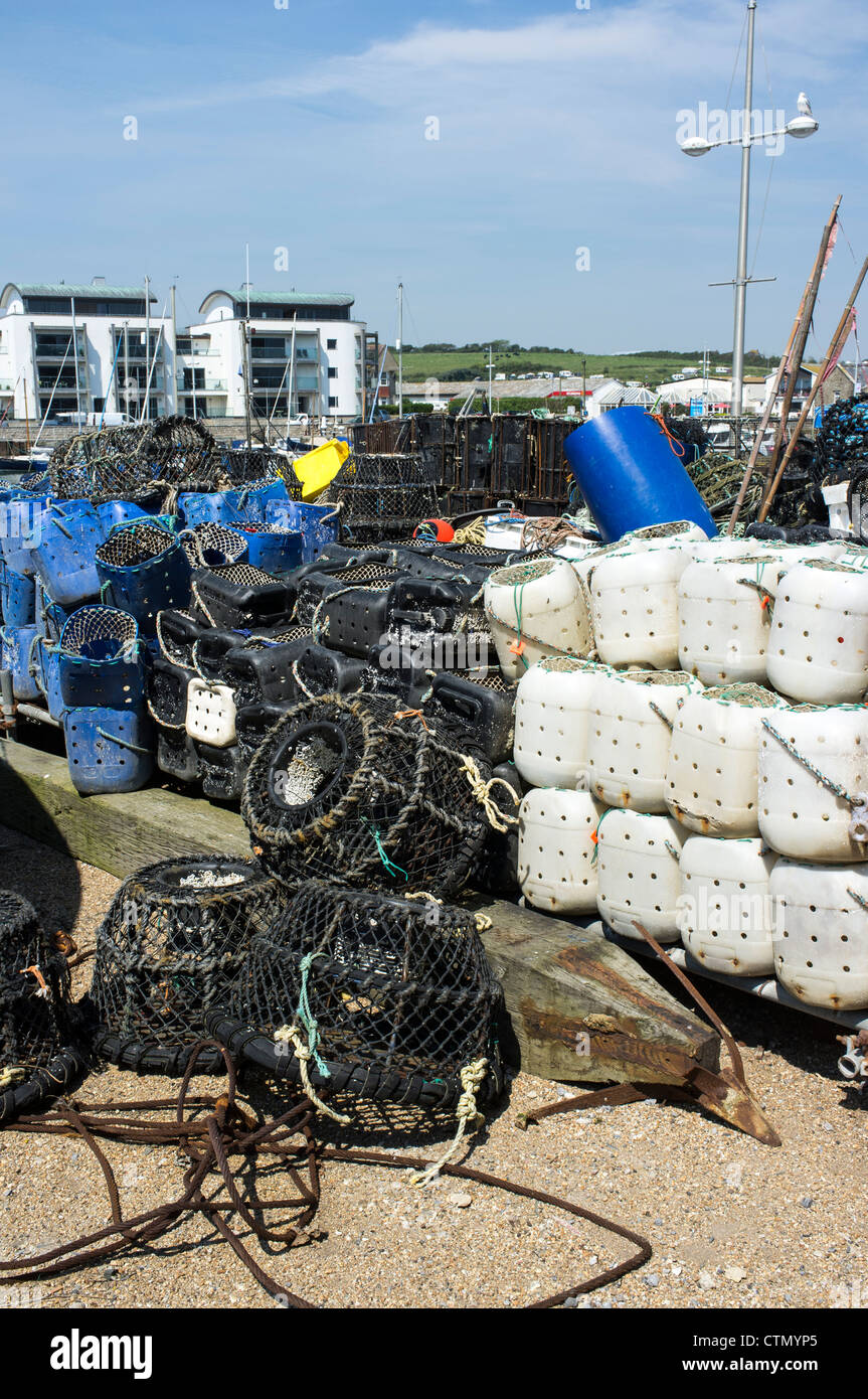 Commercially made and home made lobster pots at West Bay Dorset Stock Photo
