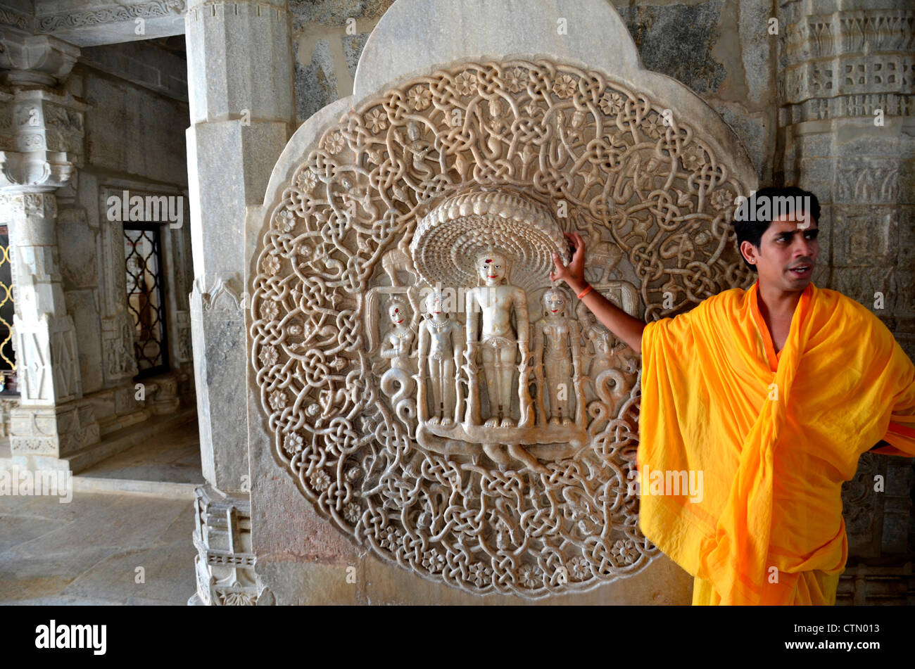 A priest explaining the significance of jain religion in Ranakpur, jain