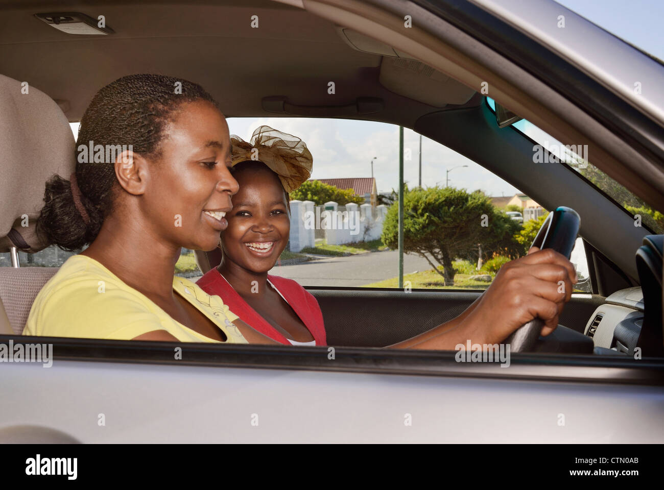 Mother and daughter together in a car, Mandalay, Cape Town Stock Photo