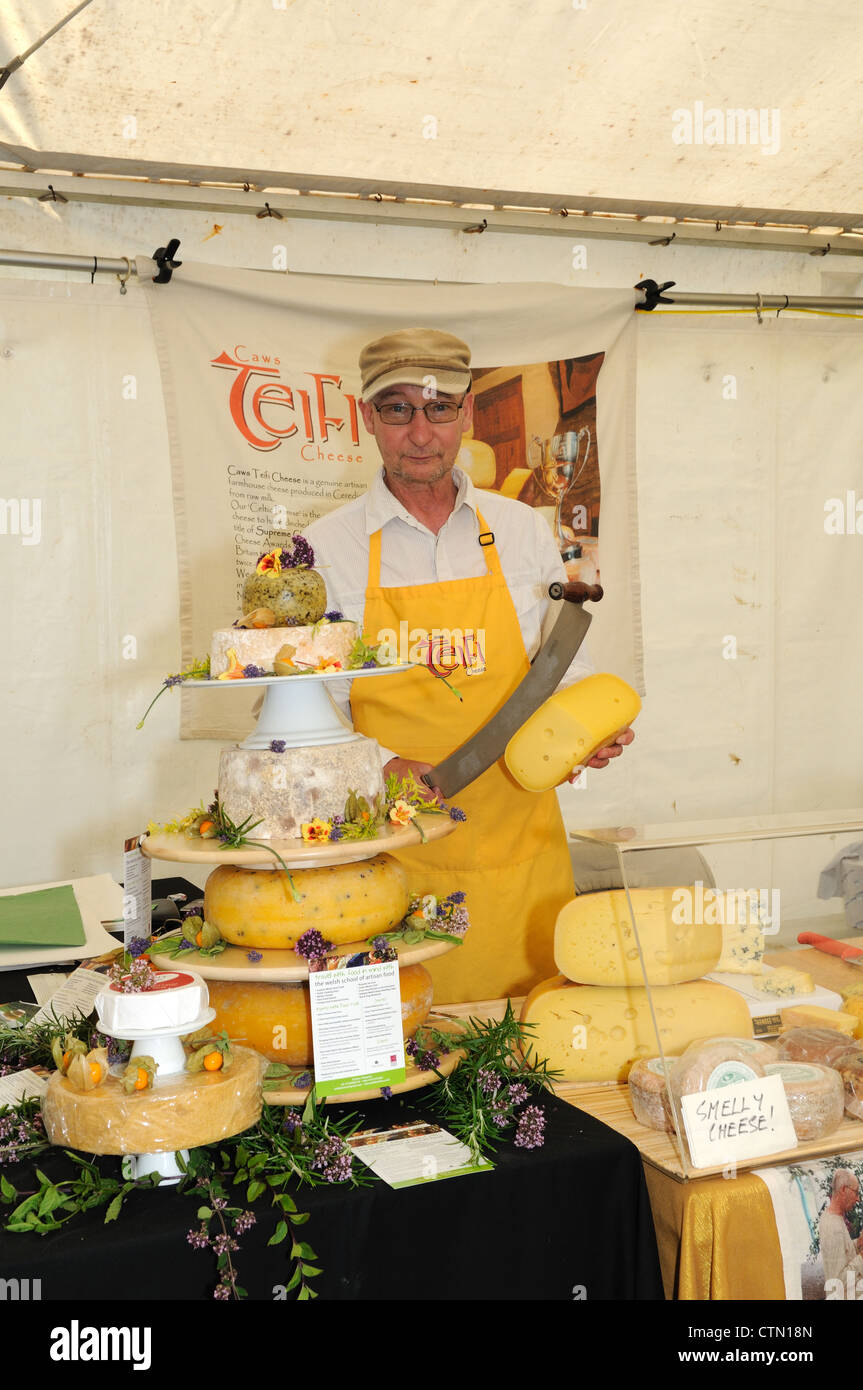 Teifi farmhouse artisan Welsh cheese maker with a display of cheese at a Pembroke food fair