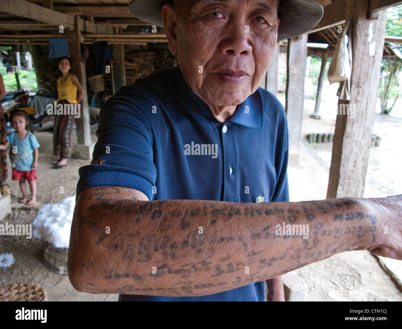 Tai Lu 'trouser' tattoos in Northern Laos. The Sak Yan (protection tattoos) tradition in Laos is much diminished. Stock Photo