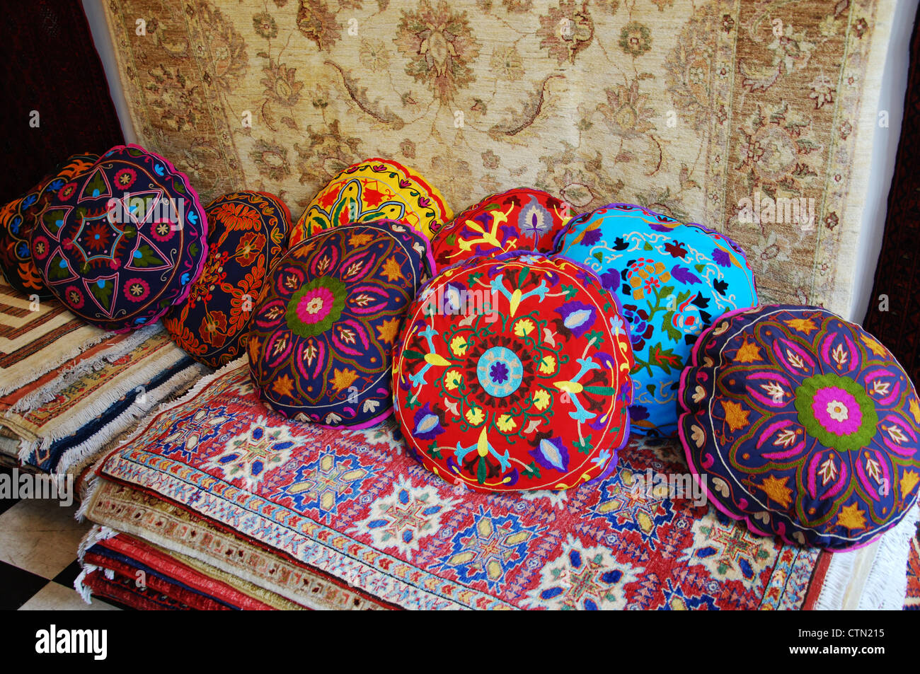 colorful pillows in carpet shop Bath UK Stock Photo Alamy