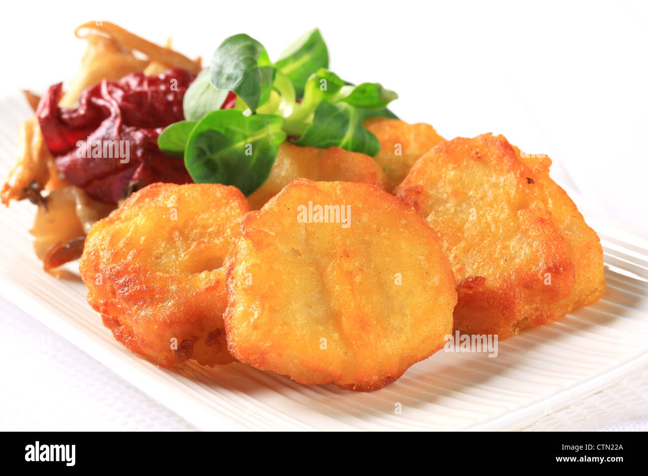 Chicken nuggets with sauteed oyster mushrooms Stock Photo Alamy