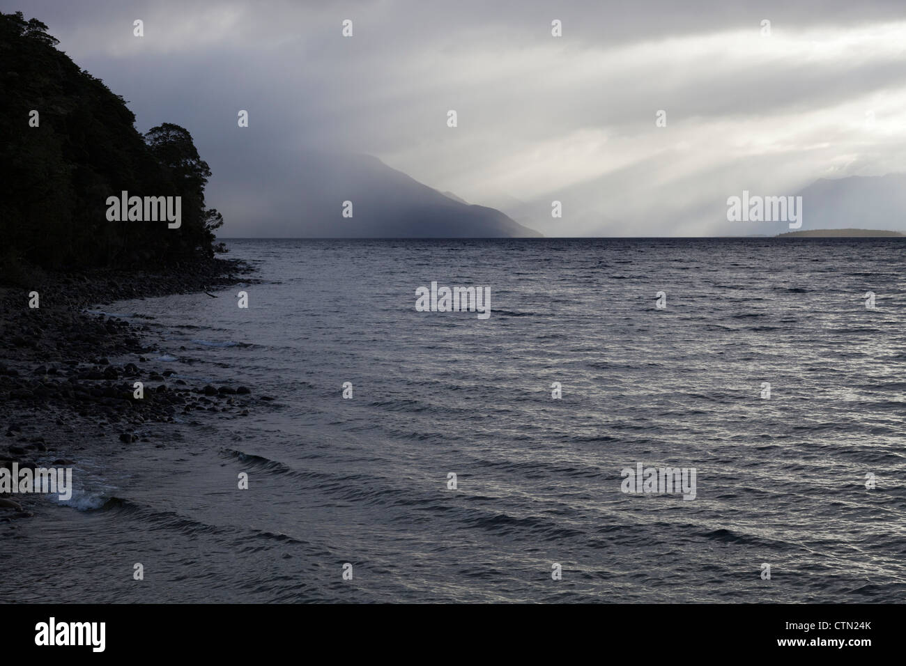 Breaking skies above Lake Te Anau, New Zealand 2 Stock Photo