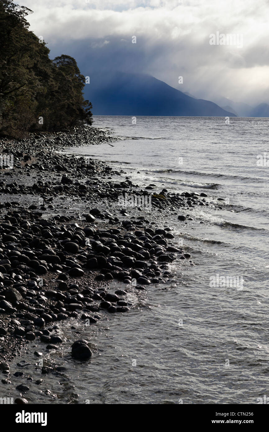 Breaking skies above Lake Te Anau, New Zealand 3 Stock Photo