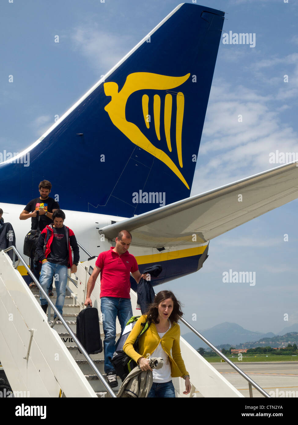 Passengers unboarding a Ryanair airplane Stock Photo