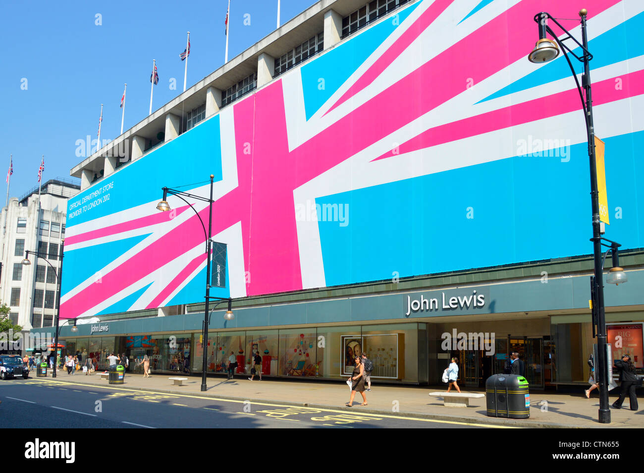 John Lewis department store in Oxford Street wrapped in a giant sized Union Flag to promote the shops status during London 2012 Stock Photo
