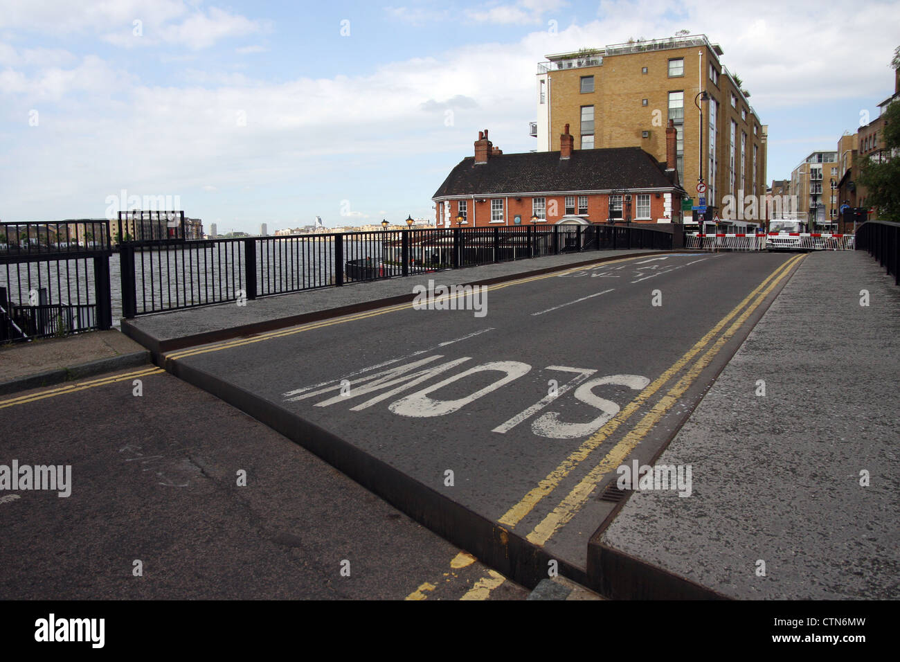 The Narrow Street Swing Bridge is sited between the Limehouse Basin