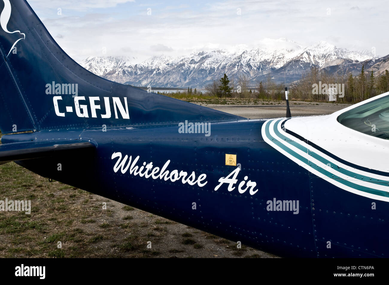The tail section of a Cessna 207A at Haines Junction airport near the St. Elias Mountains and Kluane National Park, Yukon Territory, Canada. Stock Photo