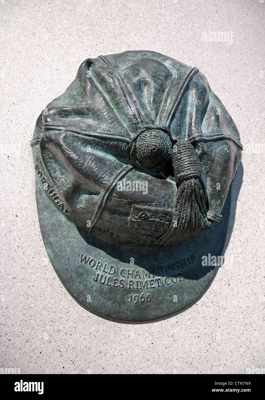 'World Championship, Jules Rimet Cup 1966' hat sculpture on the side of the Bobby Moore statue beneath Wembley Stadium Arch. Stock Photo