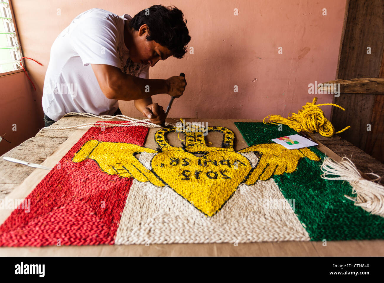 Team Roping Tapestry Craftsman creating a colorful rope tapestry in his Masaya workshop ...