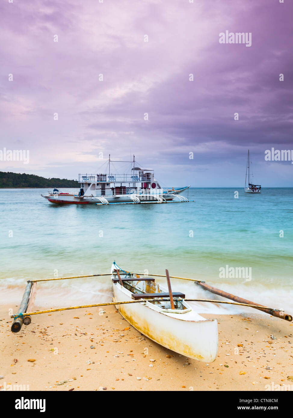 Traditional philippine boat in the tropical lagoon Stock Photo