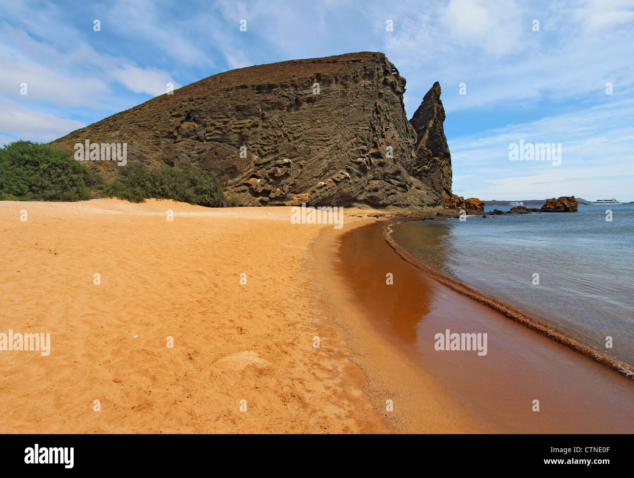 Pinnacle Rock viewed from the beach on Bartolome Island, Galapagos Stock Photo